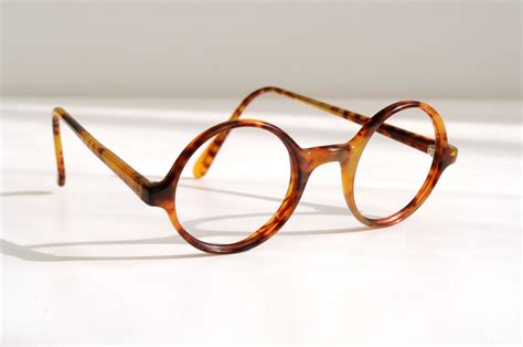 small round tortoise shell glasses